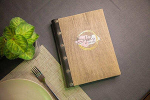 Light Wood Menu Cover with Black Elastic Band - Image 1